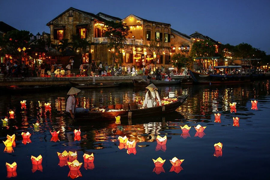 A vibrant photo of the Hoai River at night