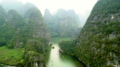 Aerial view of Trang An river and limestone mountains